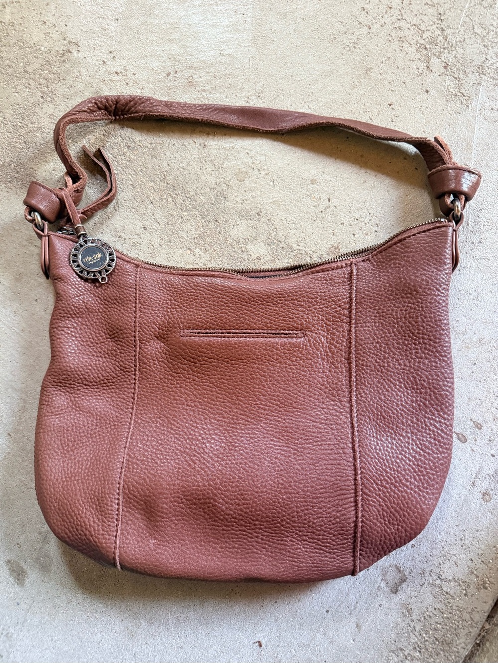 The Sak Pebbled Leather Hobo Shoulder Bag in Rust Brown